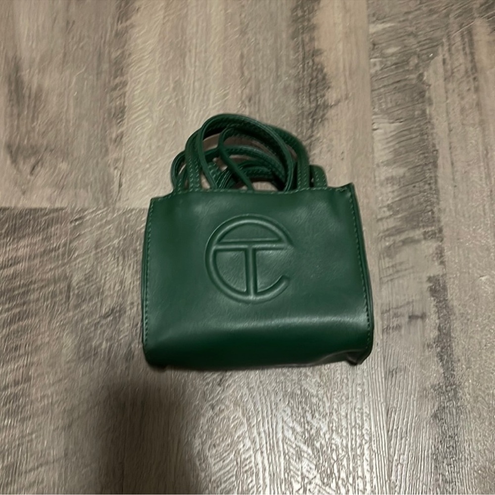 Practically brand new. No scratches or marks on purse